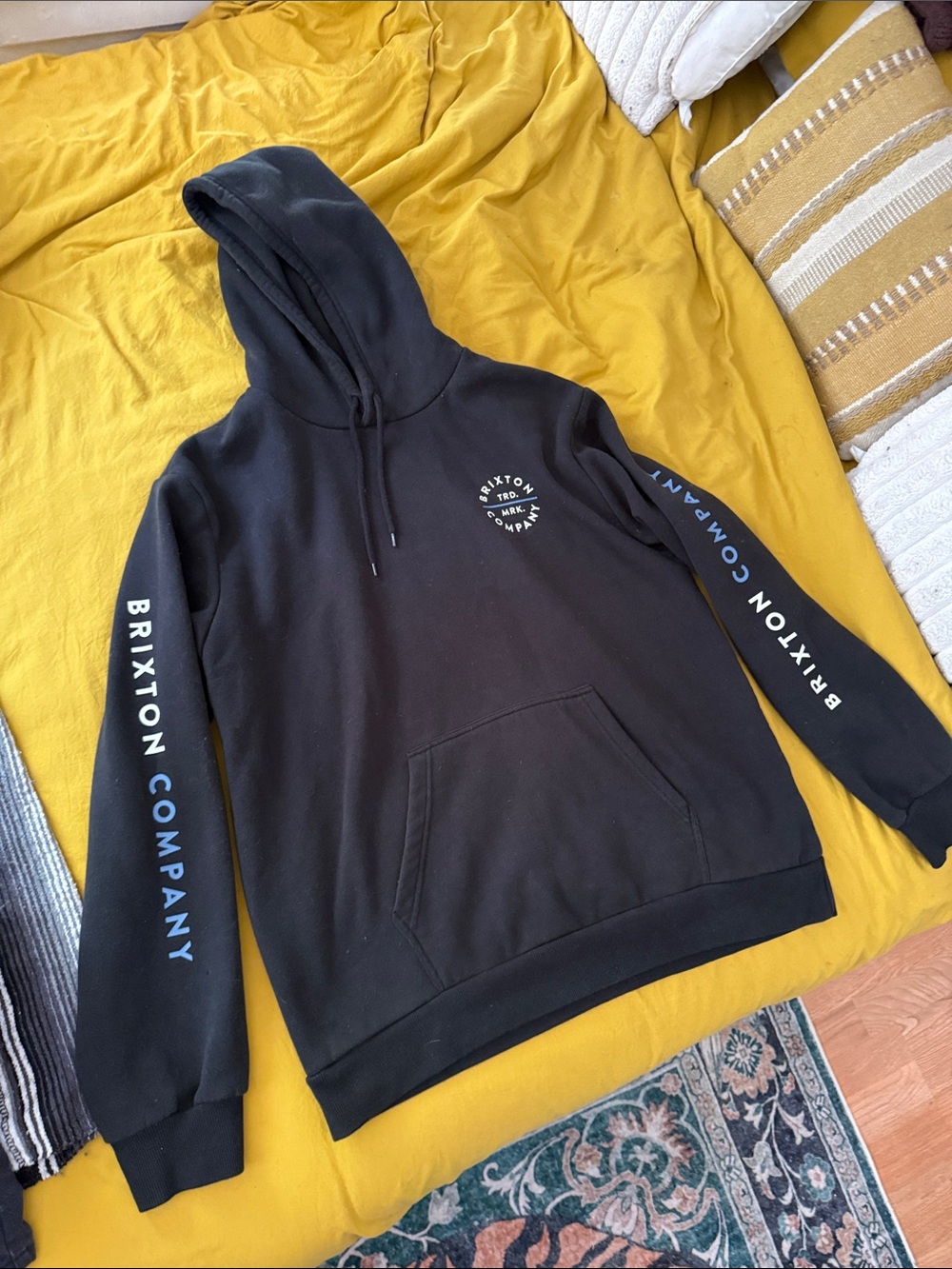 Brixton Black Pullover Hoodie with Blue/White Sleeve Text